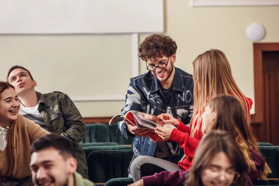 group-cheerful-happy-students-sitting-lecture-hall-before-lesson
