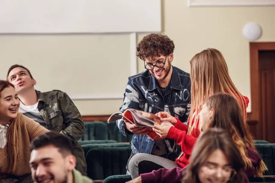group-cheerful-happy-students-sitting-lecture-hall-before-lesson